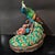 1. **Hand-Painted Ceramic Peacock Statue, Blue-Green-Yellow-Red Plumage, Floral Base** For Sale In New York - Image 6 of 7