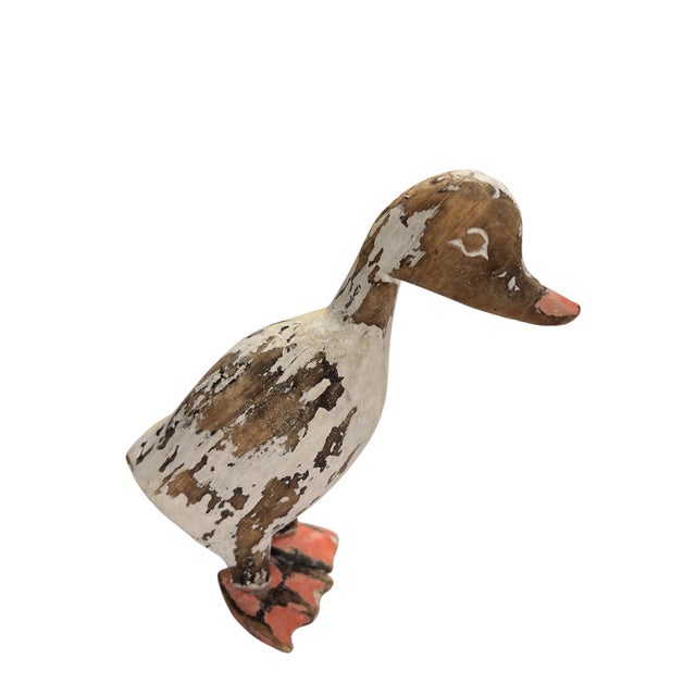 Very charming vintage folk art duck sculpture for decor or a child's room.
