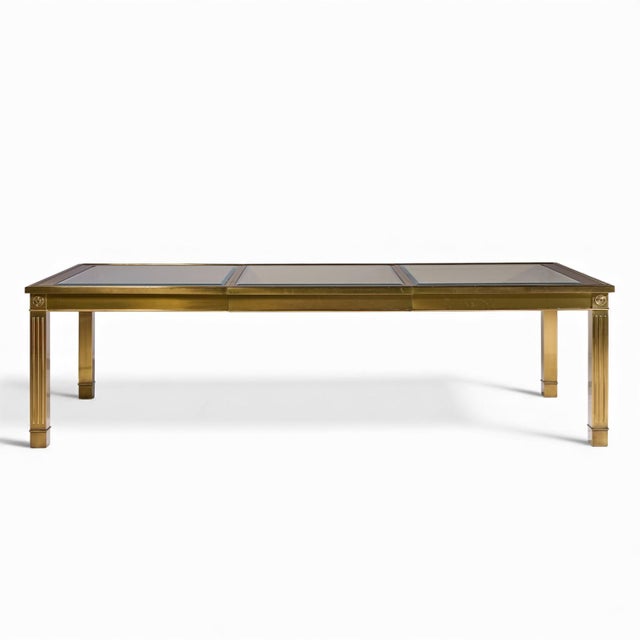 Mastercraft Mid Century Brass Expanding Dining Table with 1 Leaf This table measures: 74.25 wide x 46 deep x 30 inches...