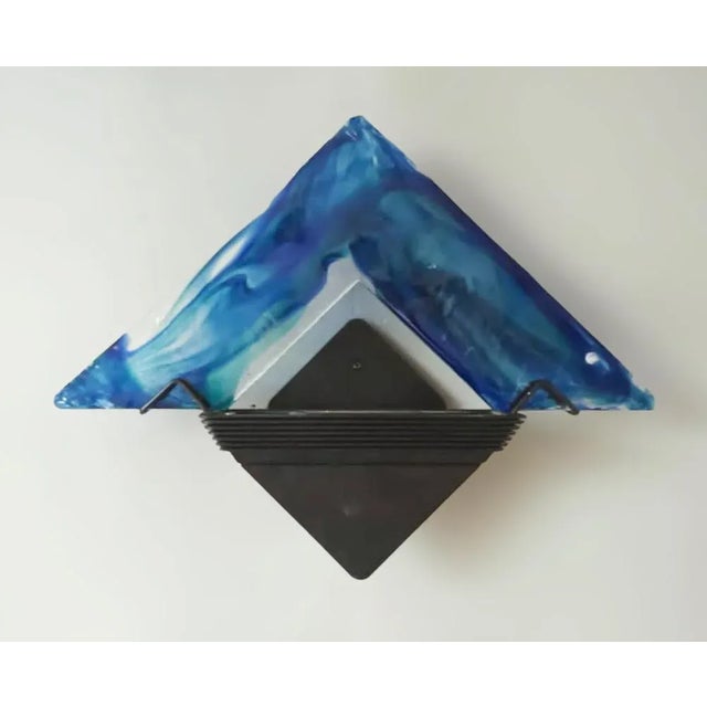 Rare unusual vintage Italian wall lights with large blue triangular hand blown Murano glass wings mounted on black...
