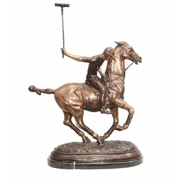 Stunning English bronze casting of a polo player in full swing Artist has really captured the energy and athleticism of...