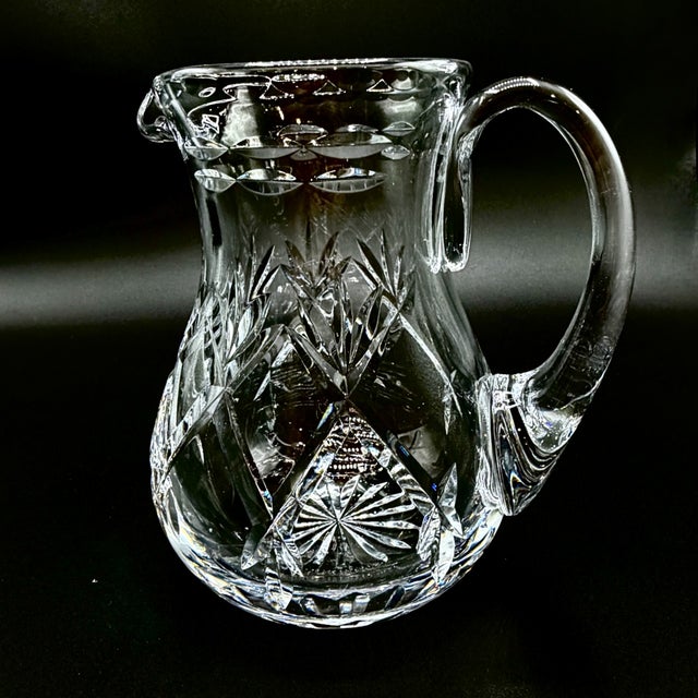 An elegant vintage cut crystal jug by Webb Corbett, England, bearing the maker’s crown mark. Substantial and beautifully...