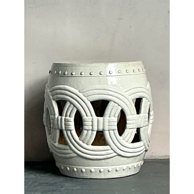 Introduce a touch of global elegance with this charming vintage glazed ceramic garden stool, a versatile piece embodying a...