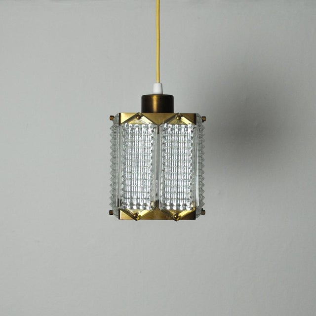 Wiktor Berndt brass and Swedish crystal ceiling light for Flygsfors, 1950s-1960s. Fine vintage condition with patination....