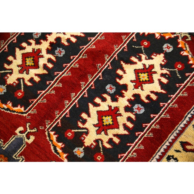 Introducing a one-of-a-kind vintage Turkish hand-knotted wool rug, carefully crafted by skilled artisans using traditional...