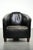 This black vintage Aviator design armchair in cowhide has a rugged appearance, with beautiful grained leather upholstery...
