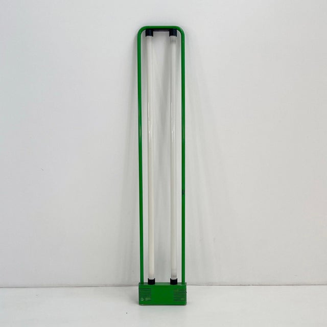 Green Double Neon Lamp by Gian N. Gigante for Zerbetto, 1980s, in Good conditions. Designed 1980 to 1989 This piece has an...