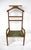 A sculptural wood framed valet dressing room chair with wonderful arms, woven seat, built in hanging rack and a smalls...