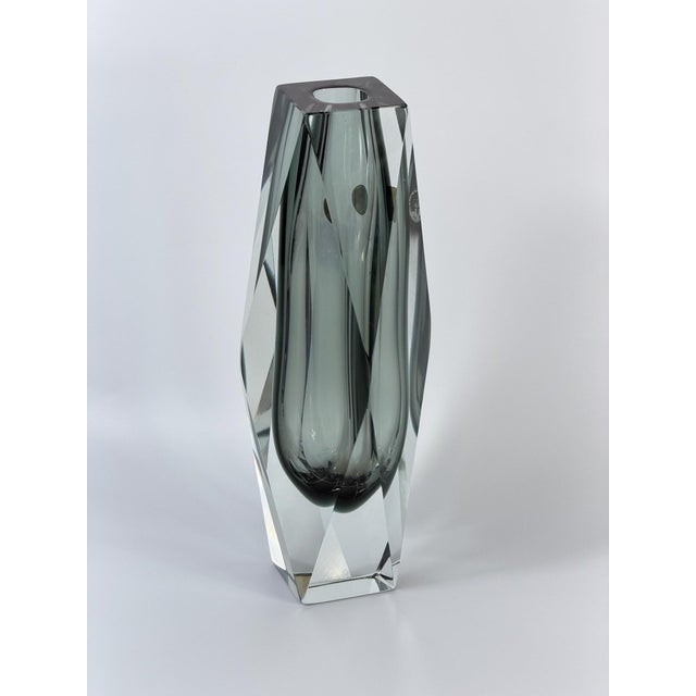 A striking large Murano glass vase dating to the 1960s–1970s, executed in the celebrated Sommerso technique and retaining...