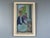 CAFE CORNER Size: 23.8 x 15.4 inches (including frame) Oil on board A charming mid-century figurative scene capturing two...