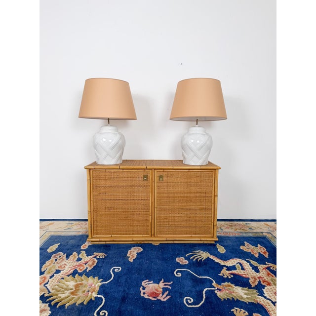 We are pleased to offer this elegant Italian Mid-Century sideboard, handcrafted in bamboo, rattan, and cane by the...