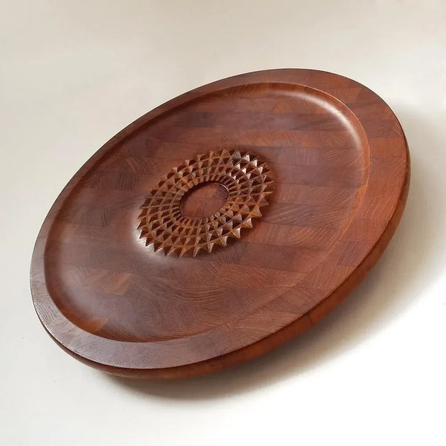 - Mid-century Danish modern teak carving board - Made by Digsmed - Two incisions on the backside which make it possible to...