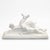 French art deco ceramic sculpture by odyv, dating from the 1930s. A stylised deer and dog are arranged in motion on a...