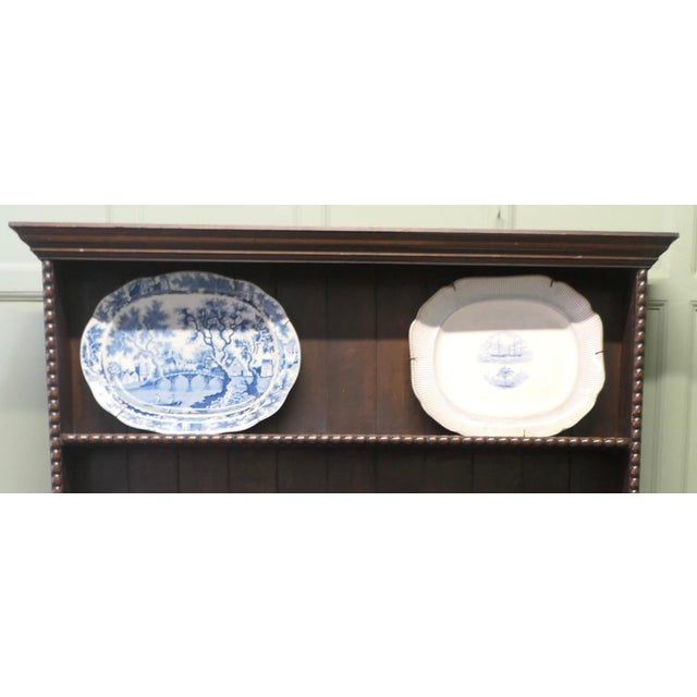 2 Early 19th Century Blue and White Chargers The Blue and White Willow Pattern charger is of St Albans Abbey, Beverley,...
