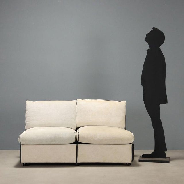 Chair-a-bank' sofa model designed by the renowned designer Mario Bellini for Cassina, dating back to the 1980s. This two-...