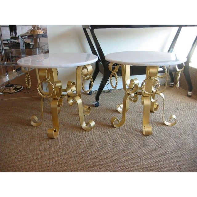 This pair of Italian fully restored 1960's side or end tables consist of the materials of of real gold leaf applied o over...