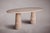 Elevate your dining experience with our double-pedestal travertine dining table. Crafted from premium travertine, renowned...