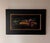 This oil on panel artwork depicts a vibrant arrangement of locally grown beets, their rich colors contrasted against a...
