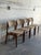 This exceptional set of 4 dining chairs features a fluid organic silhouette with curved floating backrests and sculpted...