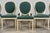This elegant set of eight antique French dining chairs is executed in the Louis XVI style and dates to the early 20th...