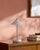 Illuminate your space with a touch of mid-century modern flair, courtesy of the Nomelle accent table lamp. Standing at an...