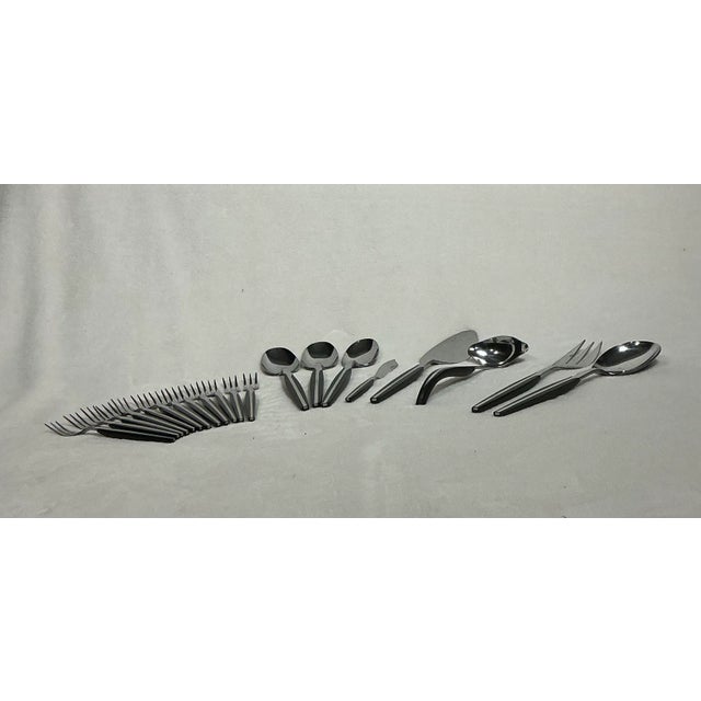 Set of Mid-Century Danish Modern Eldan Ebosi 20 piece, silverware/flatware, black handle with stainless steel silver line...