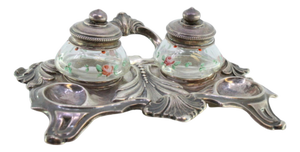 Silver Relief Inkwell with Glass Tanks, Floral Motifs and Cut-Out Feet