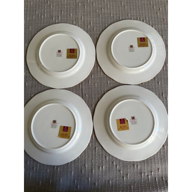 This is a Royal Albert Old Country Roses Ruby Celebration Green Chintz Salad Dessert Plate. The plate features a green...