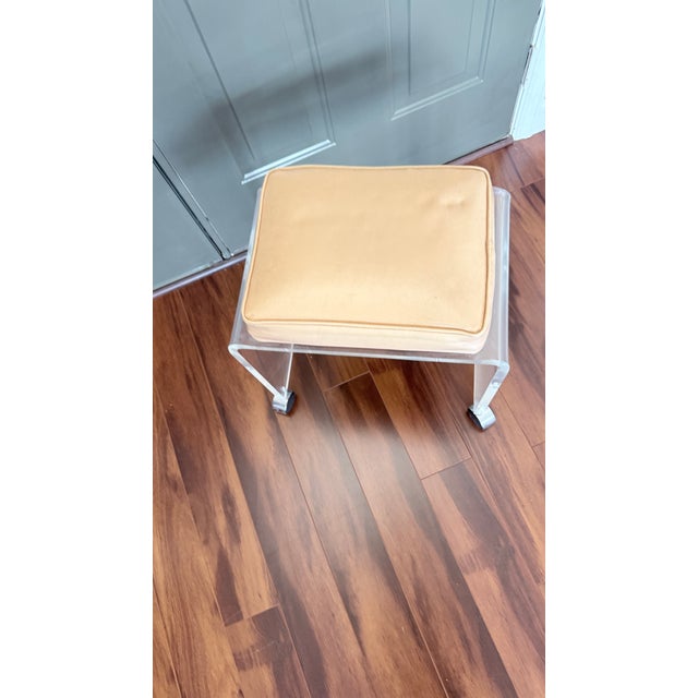 Waterfall Lucite Rolling Vanity Stool on Rollers. 1970's - leather seat that would require recovering in the fabric of...