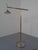 Adjustable floor lamp from Relco, Italy. The lamp is dimmable. Height: 126-162 cm. This piece has an attribution mark, I...