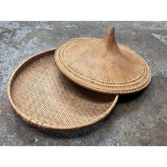 Design Plus Gallery presents a Vintage Handwoven Wicker Lidded Basket. This two-piece basket has an open-weave wicker...