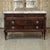 Mid-Century French Mahogany Commode with Carrara Marble Top in Louis XVI Style is a beautiful expression of neoclassic...