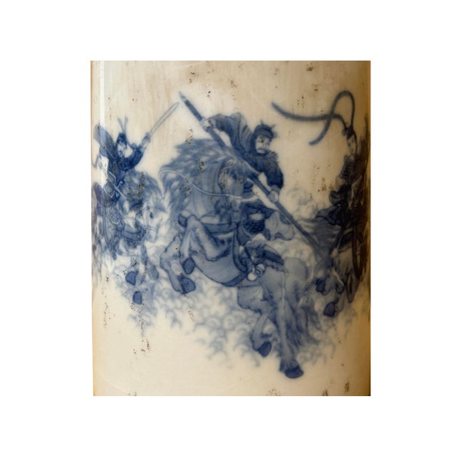 This vintage style Chinese blue and white porcelain brush pot (Bitong) showcases the refined artistry of the Republic...