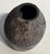 Oval vase with ribbed texture