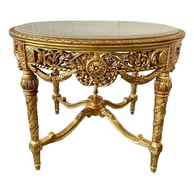 Grand French Baroque Round Coffee Table – Beige Marble Top With Ornate Gold Leaf Details For Sale