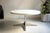 Timeless coffee table made to last. Round table top in white on a heavy aluminum base. Diameter approx. 100 cm Height...