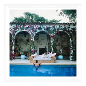 Slim Aarons, "Sofa by the Pool," January 1, 1984 Getty Images Gallery Framed Art Print