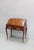 Louis XV sloping desk all sides in Mahogany veneer inlaid with foliage. The box is curved on its sides and top with a...