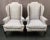 Pair of Hickory Chair Company wingback chairs in a pastet wowen check silky cotton fabric in shades of pale blue and gray....