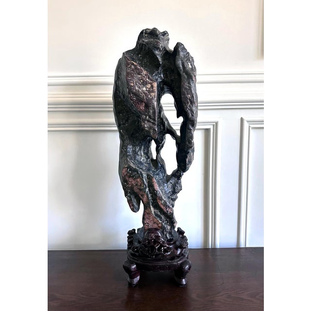 An impressive Chinese scholar Lingbi stone (also known as Gong Shi in Chinese; meditation stone and spirit rock in the...