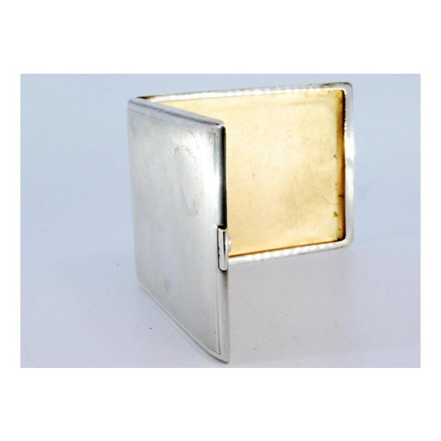 Matte Silver Cigarette Case with Borders on the Edge, in Very Good conditions. Designed 1920 to 1949 This piece has an...