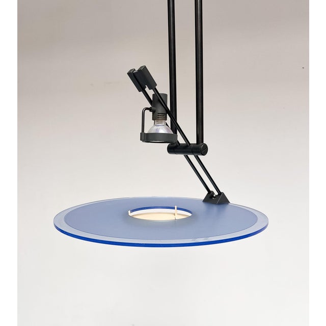 Striking postmodern pendant lamp from the Manhattan series by Alfred van Elk of Philips. A design from 1989 that allows...