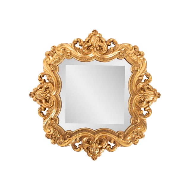 Finished in a luxurious antique gold, the ornate frame adds a touch of classic sophistication, making it a perfect accent...