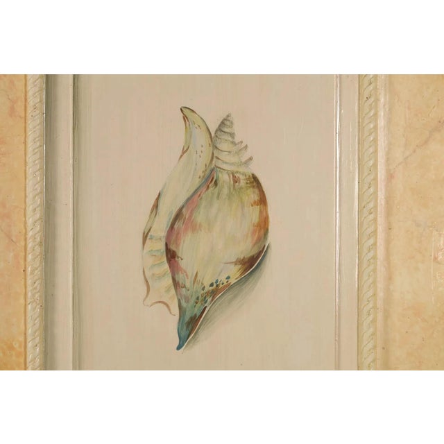Decorative four-panel folding room divider screen crafted in wood, each panel featuring a hand-painted design. The front...