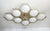 Italian midcentury flush mount with eight glossy white Murano glass shades mounted on solid brass frame in satin brass...