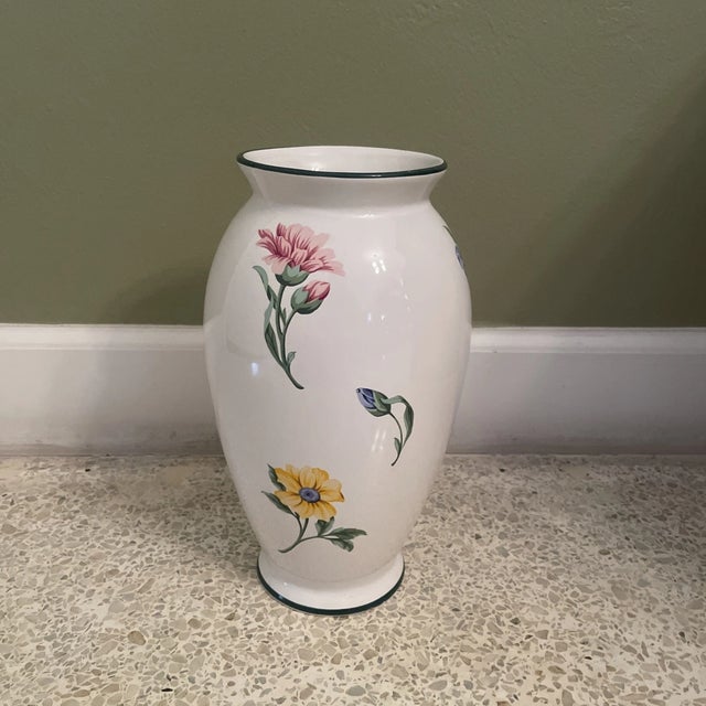 Elegant **Tiffany & Co. “Sintra” porcelain flower vase** featuring a refined hand-painted floral design and classic...