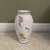 Elegant **Tiffany & Co. “Sintra” porcelain flower vase** featuring a refined hand-painted floral design and classic...
