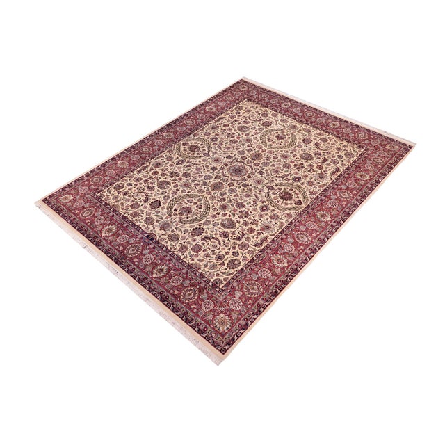 Designed with mesmerizing intricacy and gorgeous color palette, this hand-knotted masterpiece demonstrates the beauty and...