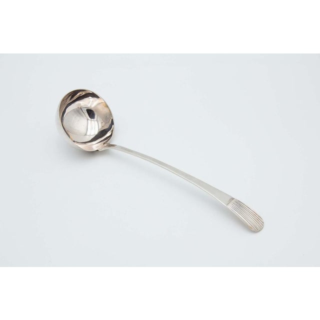 Silver Soup Ladle with Reliefs on the Handle For Sale - Image 4 of 4