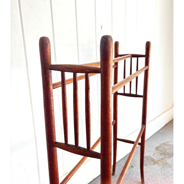 Early 1900s carved wood walnut quilt or towel rack. Some very minor surface scuffing to wood in a few places as shown....